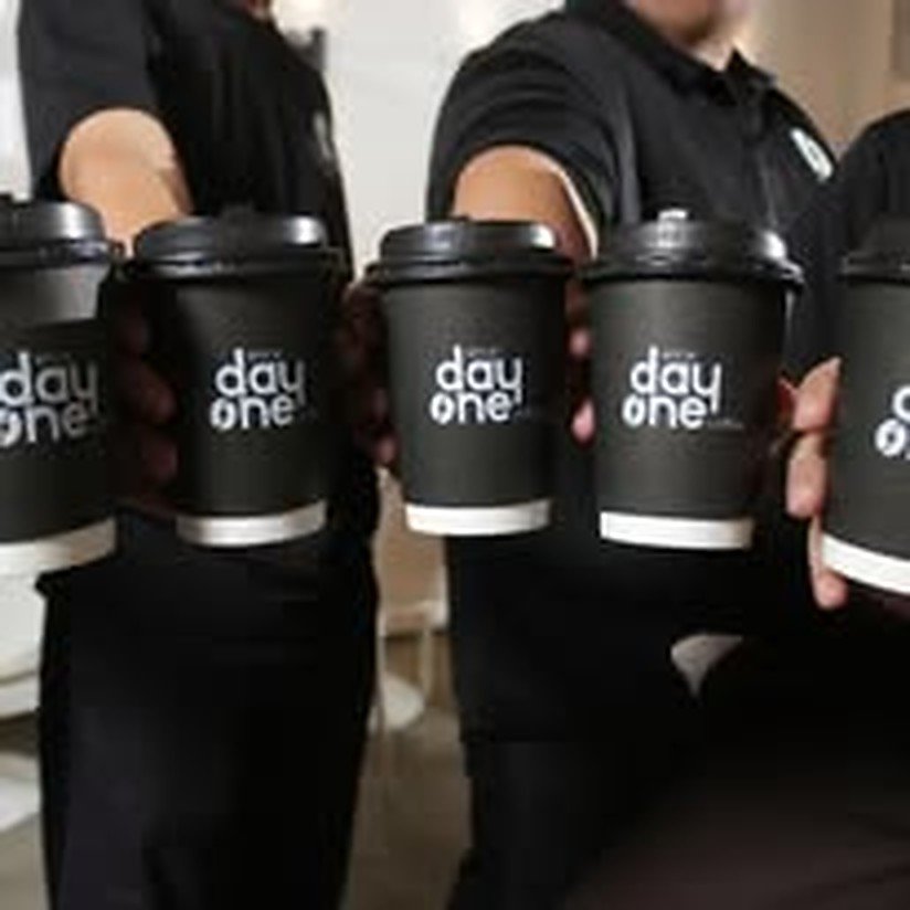 Team with Since Day One Coffee cups